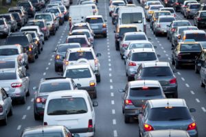 Cars in rush hour with traffic at dawn